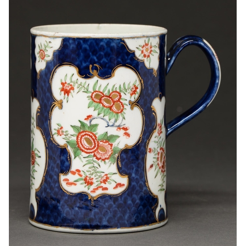 619 - A Worcester scale blue ground mug, c1770, painted in kakiemon style with chrysanthemums and foliage ... 