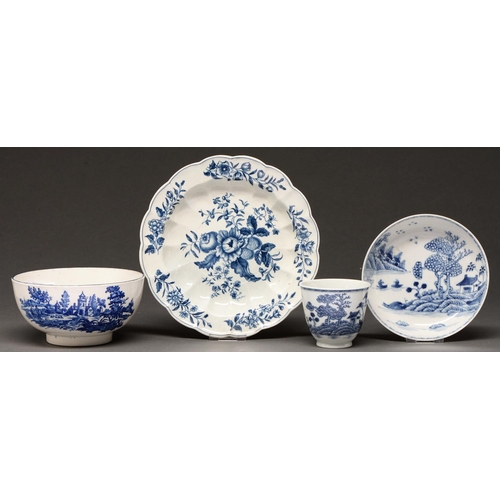 632 - A Worcester slop basin and fluted plate, c1785, transfer printed in underglaze blue with the Europea... 