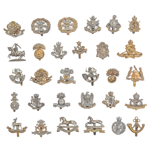 797 - An extensive collection of British army metal cap badges, including many regiments and corps, an ARP... 