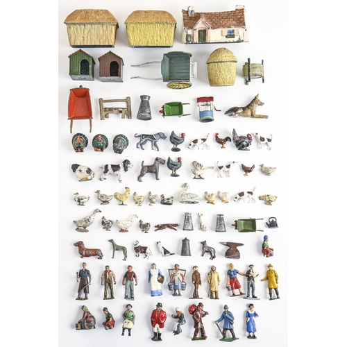 841 - A collection of William Britain's hollow cast and painted lead alloy farm animals, machinery, buildi... 