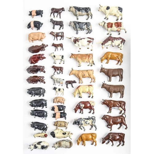 841 - A collection of William Britain's hollow cast and painted lead alloy farm animals, machinery, buildi... 