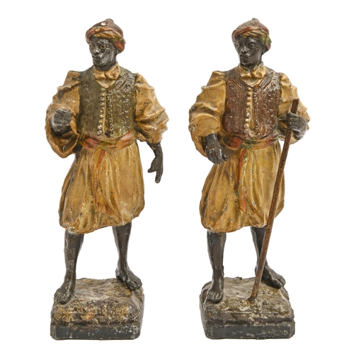 850 - A pair of cold painted spelter orientalist figures of men, late 19th c, 24cm h