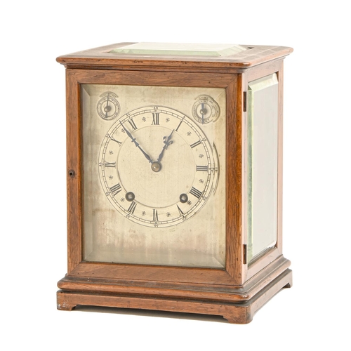 853 - A German mahogany clock, c1910, with silvered dial and CHIME / SILENT and regulation rings, the move... 