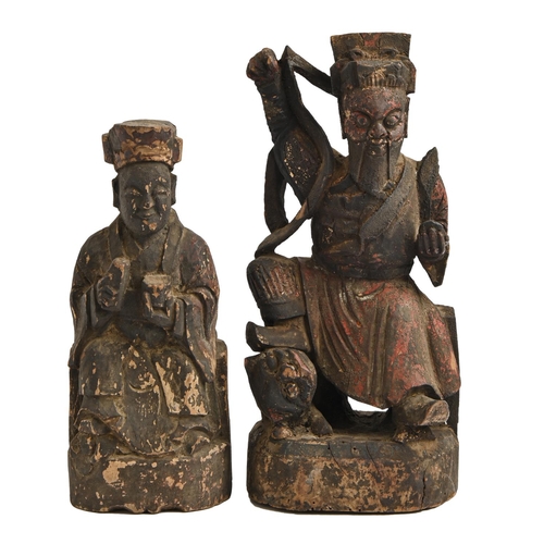 869 - Two Chinese polychrome wood sculptures of immortals, 19th c, 29 and 36cm h