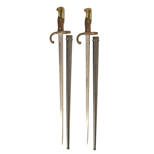 882 - Pair of Bayonets and scabbards