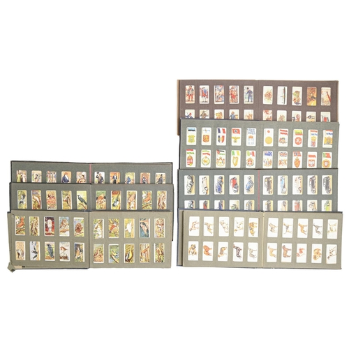 892 - Cigarette cards. A collection, various British manufacturers, the subjects principally comprising bi... 