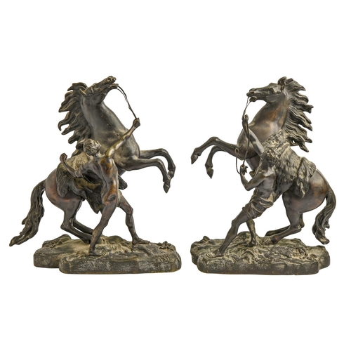 898 - A pair of bronze sculptures of the Marly horses, early 20th c, after Guillaume Coustou, even dark pa... 