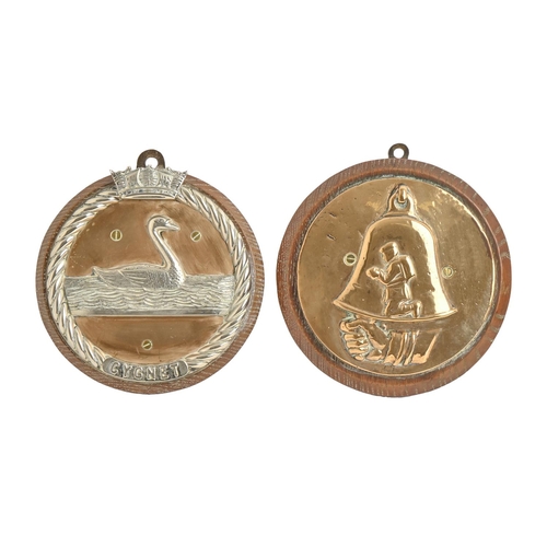 903 - Maritime relics. Two bronze ship badges of HMS Cygnet and another vessel, first half 20th c, backed ... 