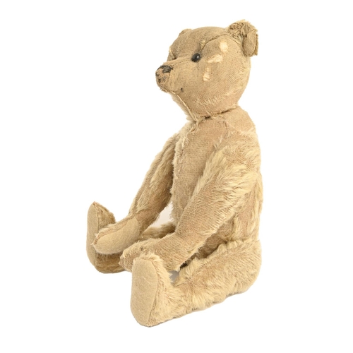 962 - An early Steiff teddy bear, c1906, straw stuffed with black stitched muzzle and black boot button ey... 