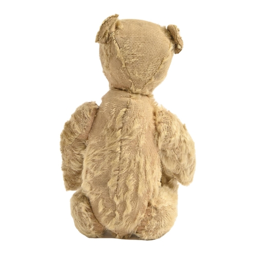 962 - An early Steiff teddy bear, c1906, straw stuffed with black stitched muzzle and black boot button ey... 