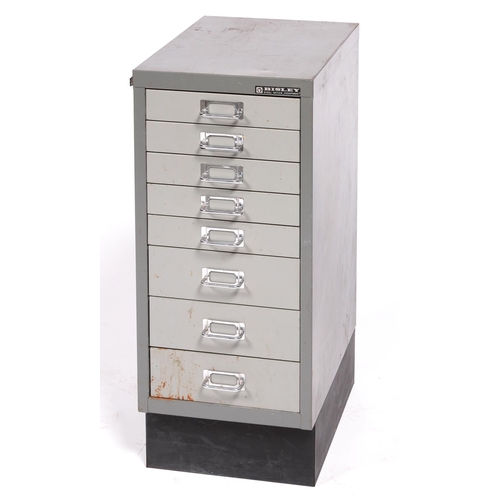 987 - A metal cabinet with eight graduated drawers, enclosing miscellaneous tools, including wooden-hafted... 