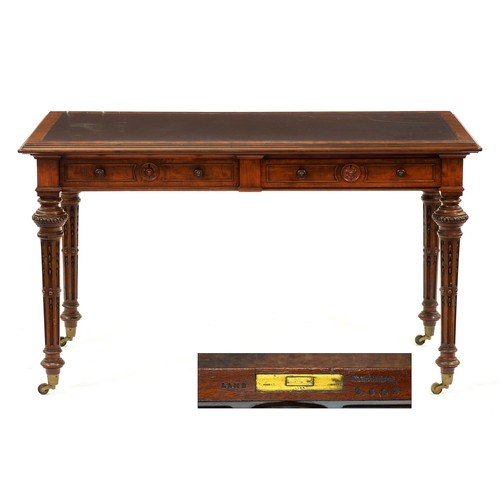 1247 - Lamb of Manchester. A Victorian mahogany writing table, the oblong top with moulded lip above two ro... 