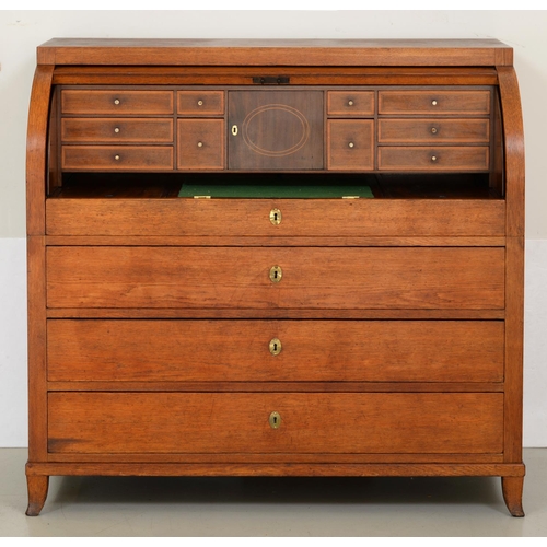497B - A Northern European oak cylinder bureau, c1800, the fitted interior with sliding front and adjustabl... 