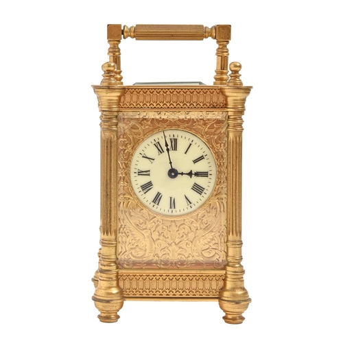 177 - A French brass carriage timepiece, early 20th c, the primrose enamel dial within pierced mask in pil... 