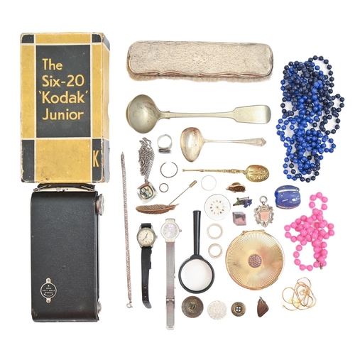 191 - A silver clothes brush, a Stratton compact and costume jewellery, including a silver watch fob shiel... 