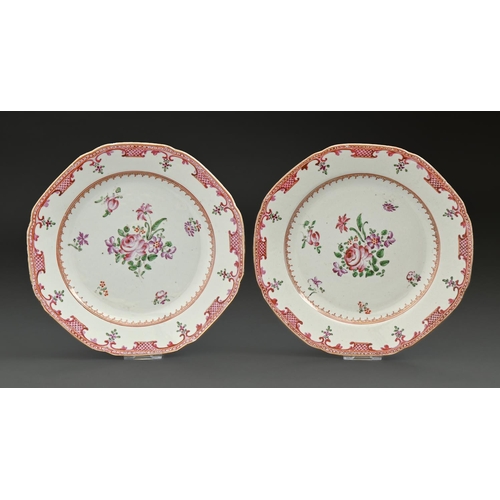2 - A pair of Chinese export porcelain octagonal famille rose plates, c1780, painted with flowers in red... 