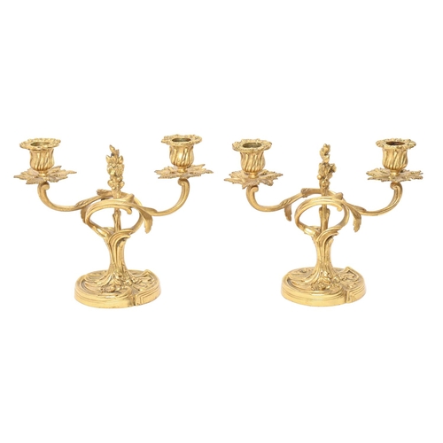 202 - A pair of giltmetal twin branch candelabra, early 20th c, 20cm h x 24cm w