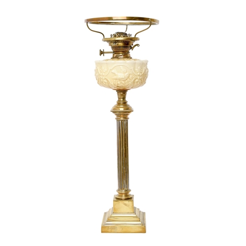 217 - A brass columnar oil lamp, early 20th c, the opaque glass fount moulded with birds, brass Hinks No 2... 