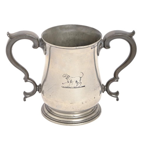 226 - An English baluster pewter loving cup, 1836-63, finely engraved with Talbot crest, glass bottom, 16c... 