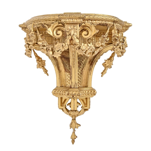 260 - A Regency giltwood and composition wall bracket, 45cm h; 45cm l