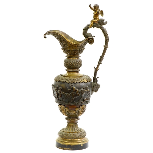 263 - A French bronze Bacchanalian ewer of unusually large size, late 19th c, the up-scrolled handle set w... 