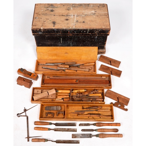 296 - A tool chest and miscellaneous woodworking tools, early 20th c, the interior with lidded compartment... 