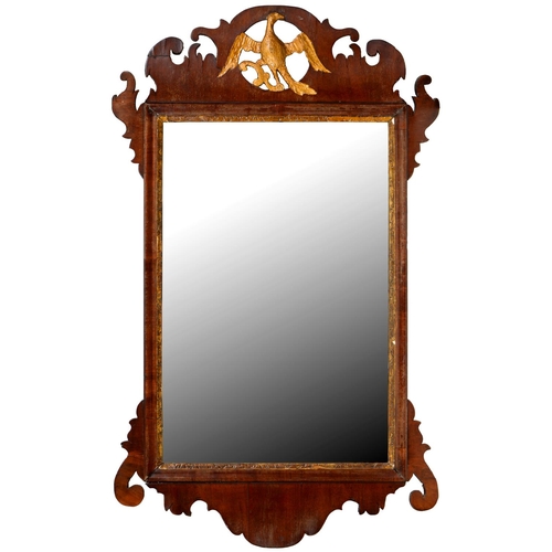 452 - A parcel gilt walnut fretted frame mirror, late 19th c, 81cm h