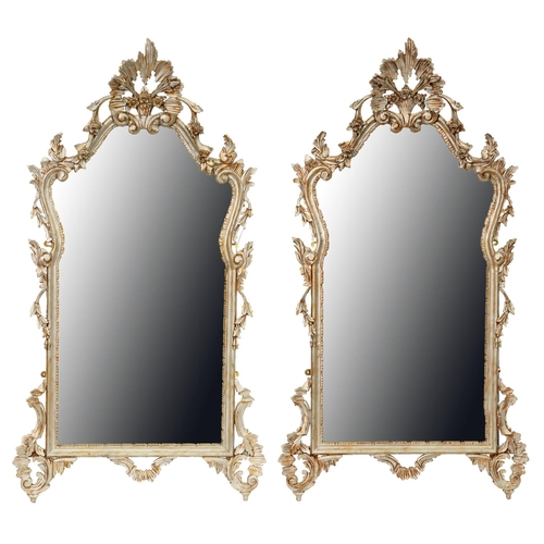 485 - A pair of rococo style silvered wood mirrors, late 20th c, 133 x 66cm