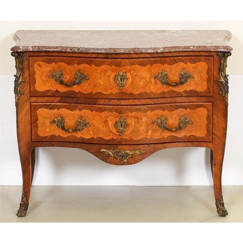 497C - A French kingwood, tulipwood and floral marquetry commode, early 20th c, with ormolu mounts, the mar... 