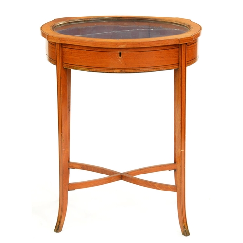 506 - An Edwardian oval satinwood and line inlaid display table, 77cm h; 45 x 60.5cm