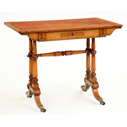 511 - An early Victorian maple, walnut and inlaid writing table, with tooled leather inlet top, the inlaid... 