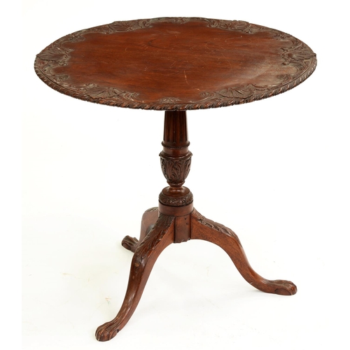 532 - A Victorian carved and stained wood tripod table, 70cm h; 71cm diam
