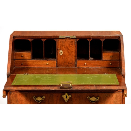544 - A George II walnut and featherbanded bureau, fitted interior, 96cm h; 46 x 84cm