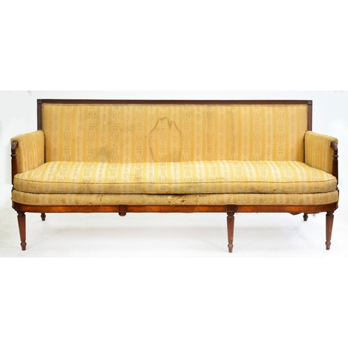 559 - A George IV mahogany settee, with channelled frame and reeded tapering pillars to the arms, conformi... 