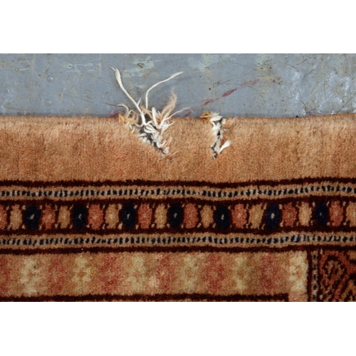 562 - A rug, 180 x 127cm