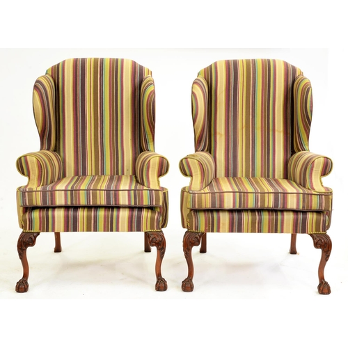 564 - A pair of wing armchairs, late 20th c, in George II style, on carved cabriole legs, 119cm h... 