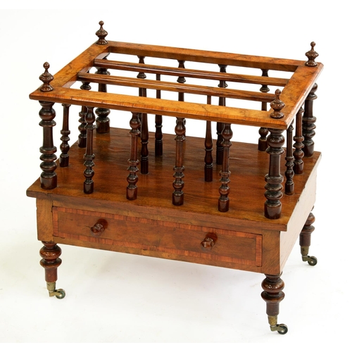 565 - A Victorian walnut canterbury, with turned spindles and legs, brass castors, 56cm h; 38 x 54cm... 