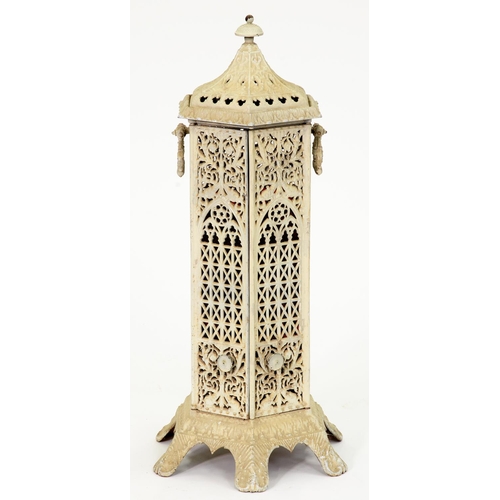 570 - A Victorian cast iron hexagonal pillar stove and cover, with carrying handles and oil lamp, 83cm h... 