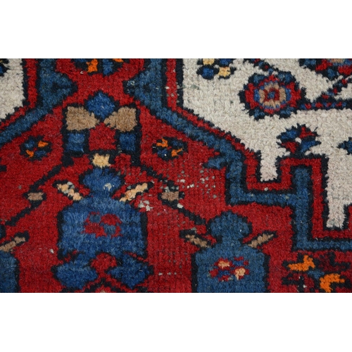 571 - A rug, 204 x 129cm