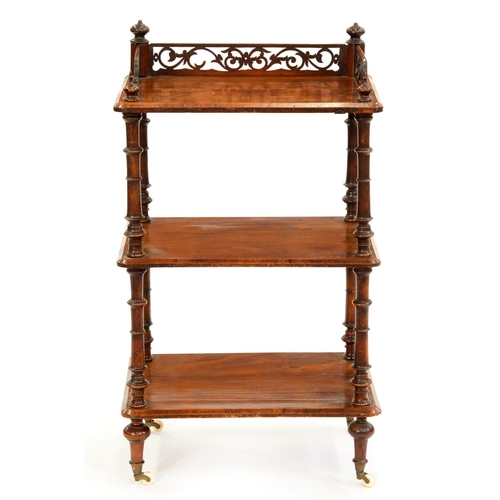 589 - A Victorian walnut whatnot, with fretwork gallery, on turned feet with pottery castors, 92cm h; 36 x... 