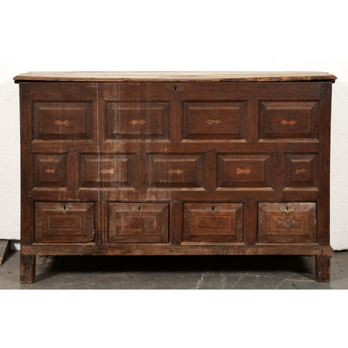 599 - A George III oak mule chest, raised and fielded, inlaid panels to the front and drawers on stiles, 1... 