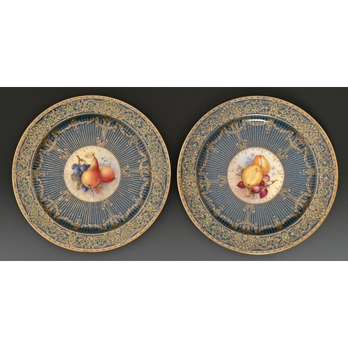 71 - A pair of Royal Worcester dessert plates, 1922, painted to the centre by R Sebright, both signed, wi... 