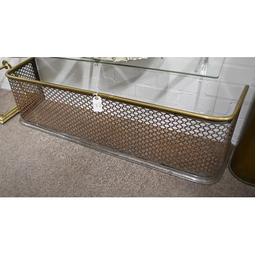 1456 - A Victorian brass fender, 163cm x 36cm, two later pierced brass fenders, 80cm w and smaller and an e... 