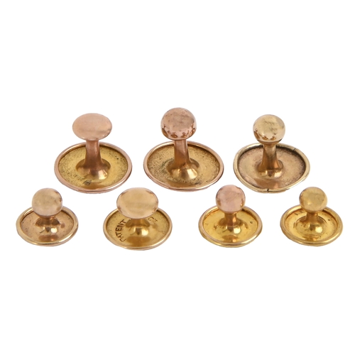 111 - Six gold dress studs, marked 9ct, 4.5g and one other marked 15ct, 0.8g (7)