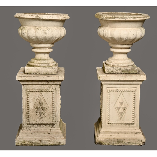 1164 - A pair of reconstituted stone garden vases and pedestals, 94cm h