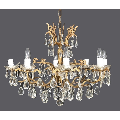 1167 - An eight-branch giltmetal and glass chandelier, 75cm w