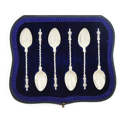 253 - A set of six George V silver coffee spoons, Apostle pattern, by Atkin Brothers, Sheffield 1910, case... 