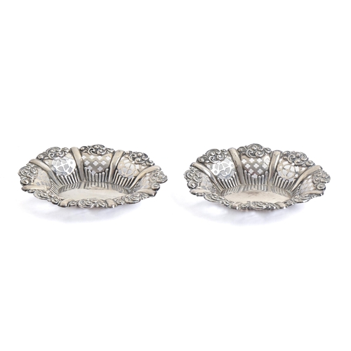 263 - A pair of Edwardian die stamped silver bonbon dishes, 11cm l, by Alfred Everington, Chester 1902, 1o... 