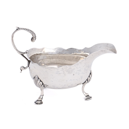 270 - A George III silver cream boat, on three hoof feet, 85mm h, by Thomas Streetin, London 1771, 3ozs 5d... 