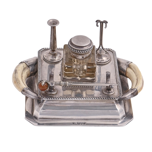 298 - A Victorian silver inkstand and pen rest, with boar's tusk handles, 20.5cm over handles, by Hukin &a... 